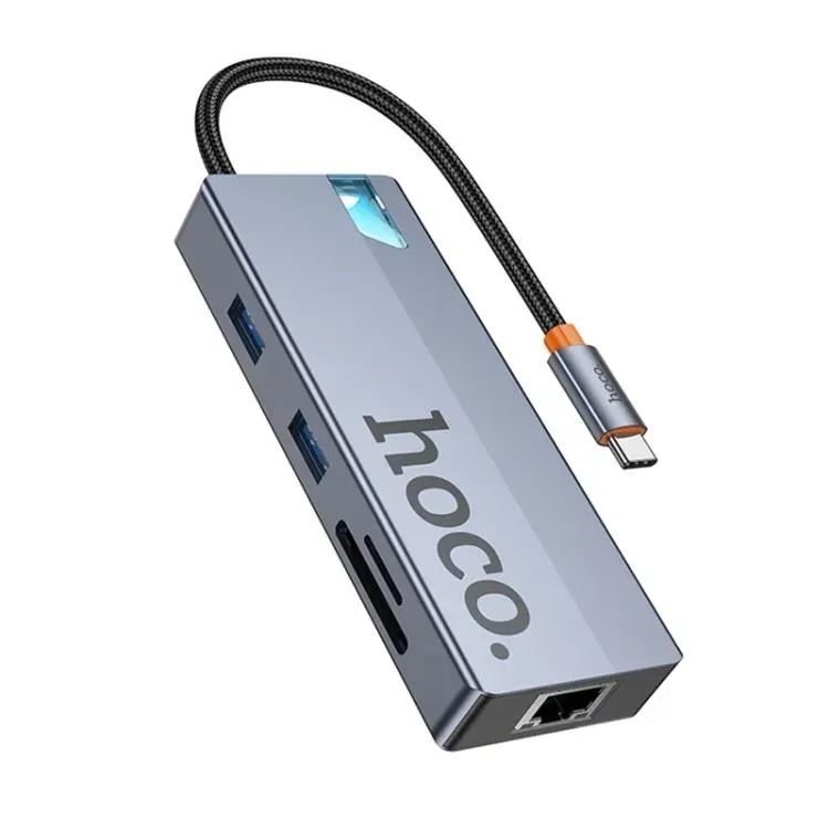 Hoco HB52 USB хаб Type-C 8-в-1, HDTV, RJ45 100 Mbps, SD, TF, PD, Type-C 3.0, 2 USB 3.0, сірий Hoco HB52 USB хаб Type-C 8-в-1, HDTV, RJ45 100 Mbps, SD, TF, PD, Type-C 3.0, 2 USB 3.0, сірий